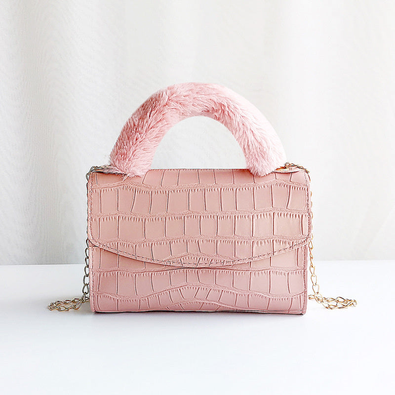 Modische Handtasche aus Plüsch mit Steinmuster