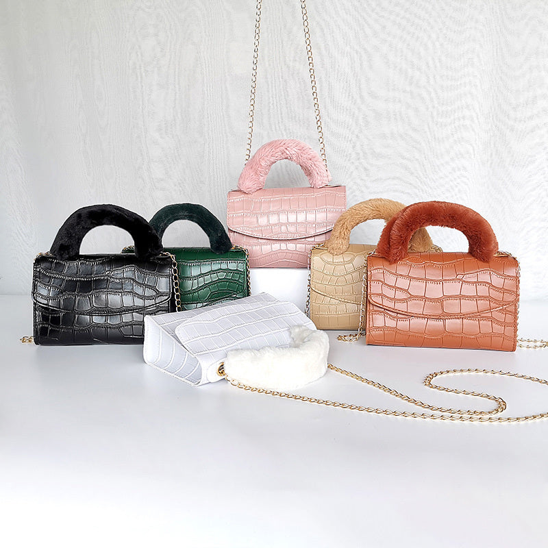 Modische Handtasche aus Plüsch mit Steinmuster