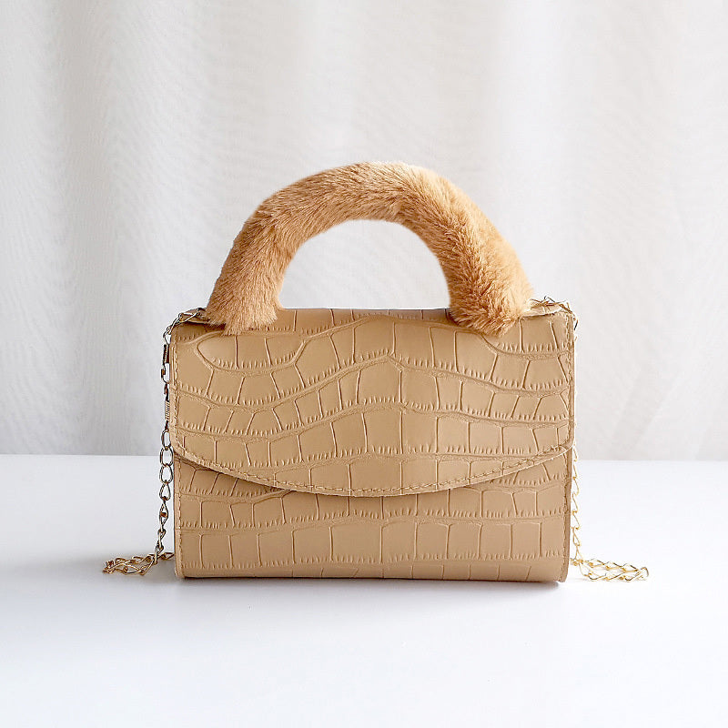 Modische Handtasche aus Plüsch mit Steinmuster