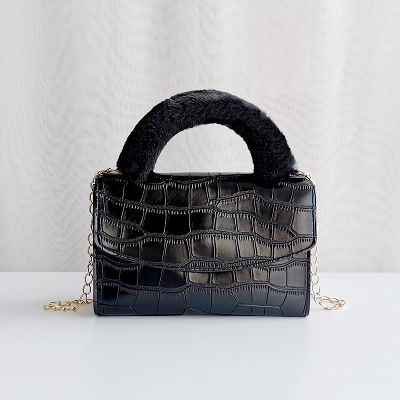 Modische Handtasche aus Plüsch mit Steinmuster