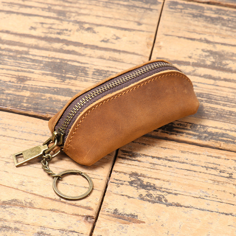 Multifunktionale Clutch aus Leder für Herren