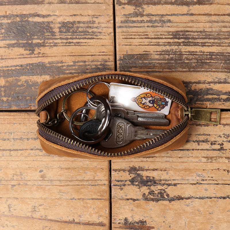 Multifunktionale Clutch aus Leder für Herren