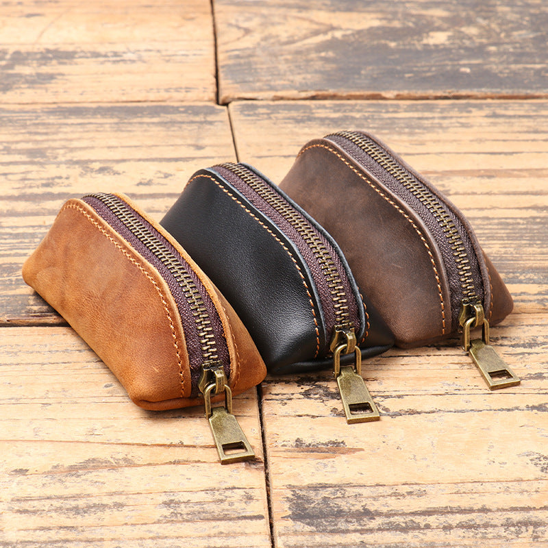 Multifunktionale Clutch aus Leder für Herren