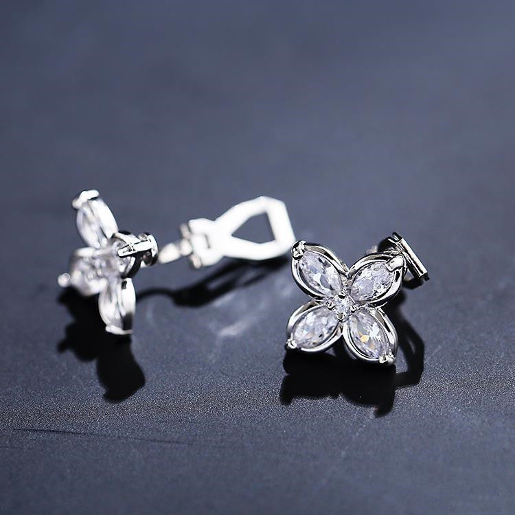 Simple Ladies Clip Earrings Personality Four-leaf Flower