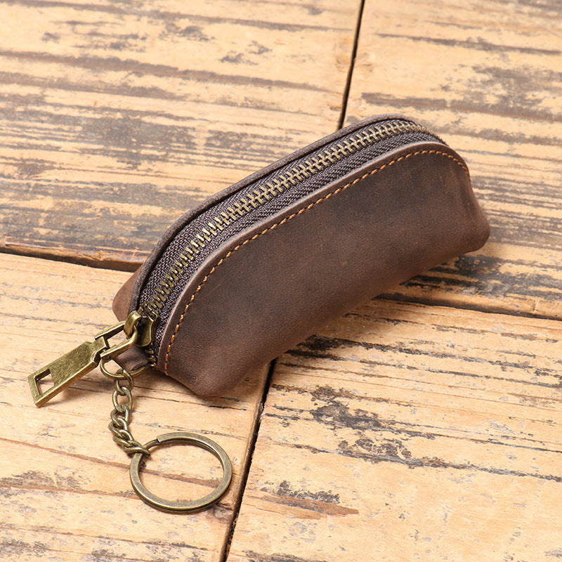 Multifunktionale Clutch aus Leder für Herren