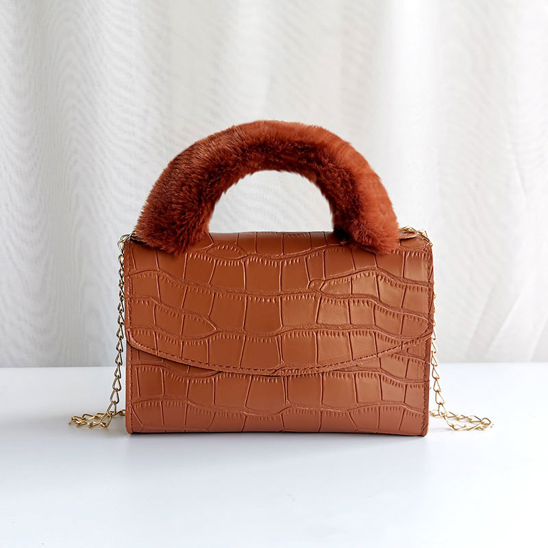 Modische Handtasche aus Plüsch mit Steinmuster