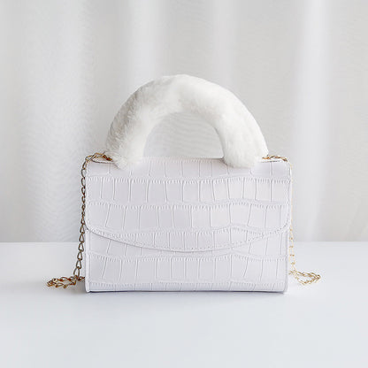 Modische Handtasche aus Plüsch mit Steinmuster