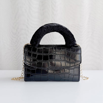 Modische Handtasche aus Plüsch mit Steinmuster
