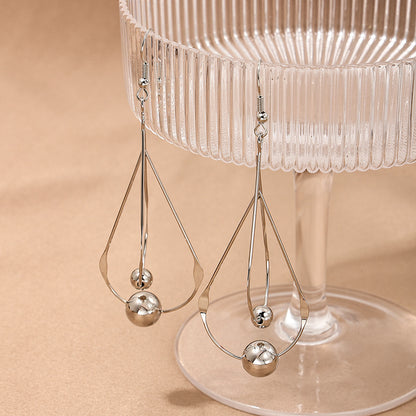 Female French Style Temperament Hollow Water Drops Tassel Long Earrings