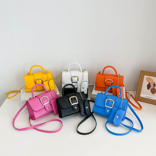 Kleine quadratische Handtasche in Bonbonfarbe, schlichte Retro-Handtasche