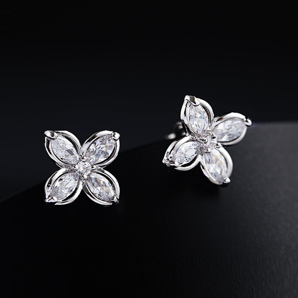 Simple Ladies Clip Earrings Personality Four-leaf Flower